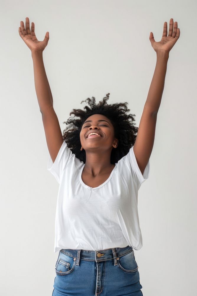 Excited african american woman raised her hands up smile white background relaxation.