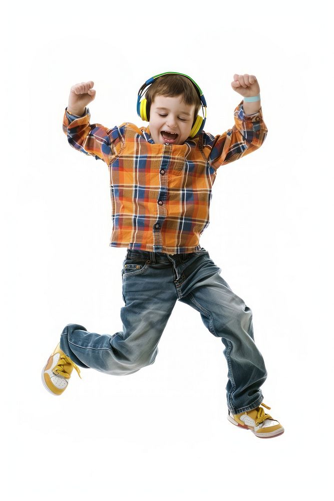 Kid wearing music head phone dancing portrait smiling.