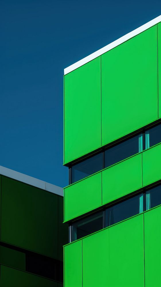 High contrast office building architecture outdoors green.