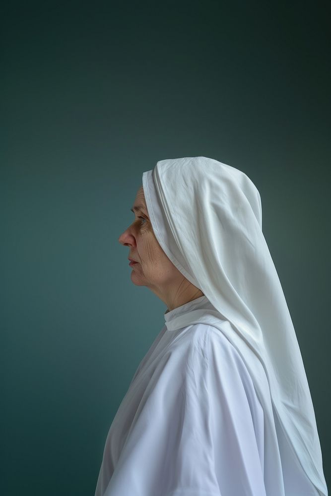 Nun side portrait female person adult.