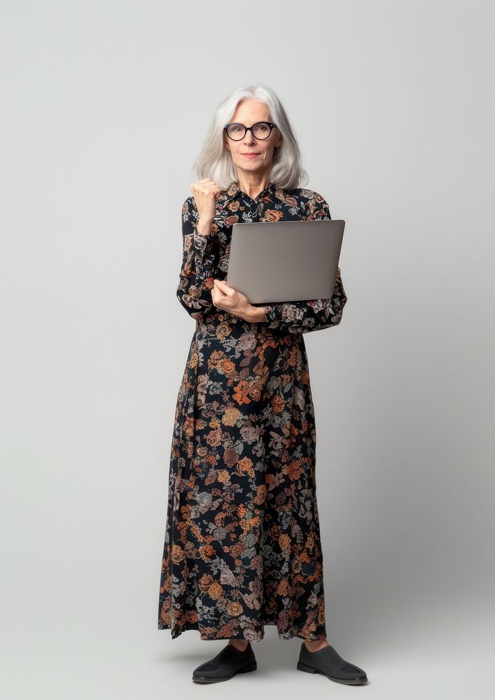 Woman with laptop photography standing glasses.