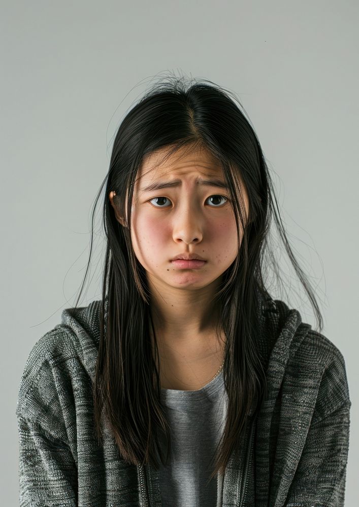 Asian teenage girl crying portrait photo face.