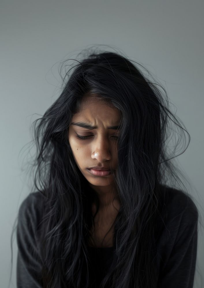 Indian teenage girl crying portrait photo face.
