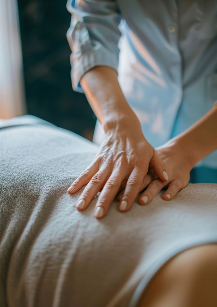 A woman massaging spa massage person.