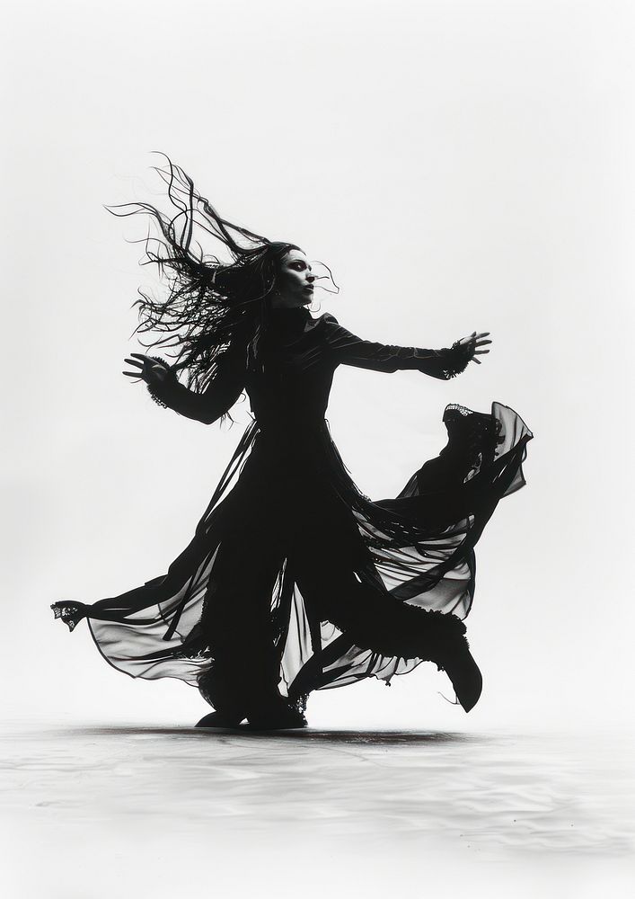 A woman dancing recreation clothing apparel.