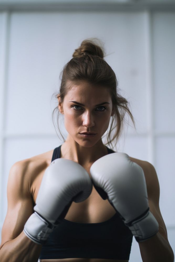 Woman practicing boxing punching sports adult.