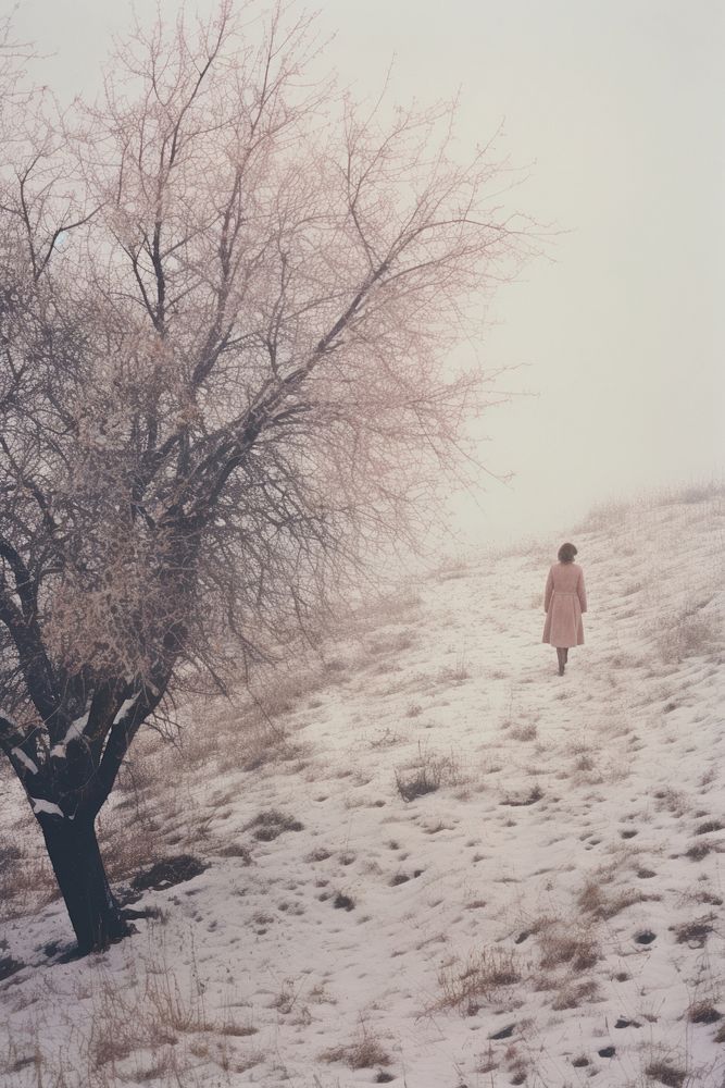 Woman walking in snow land photography landscape.