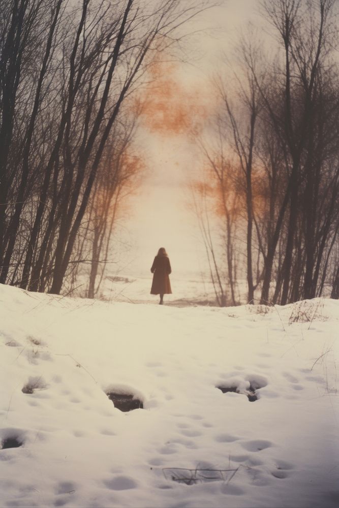 Woman walking in snow landscape photography standing.