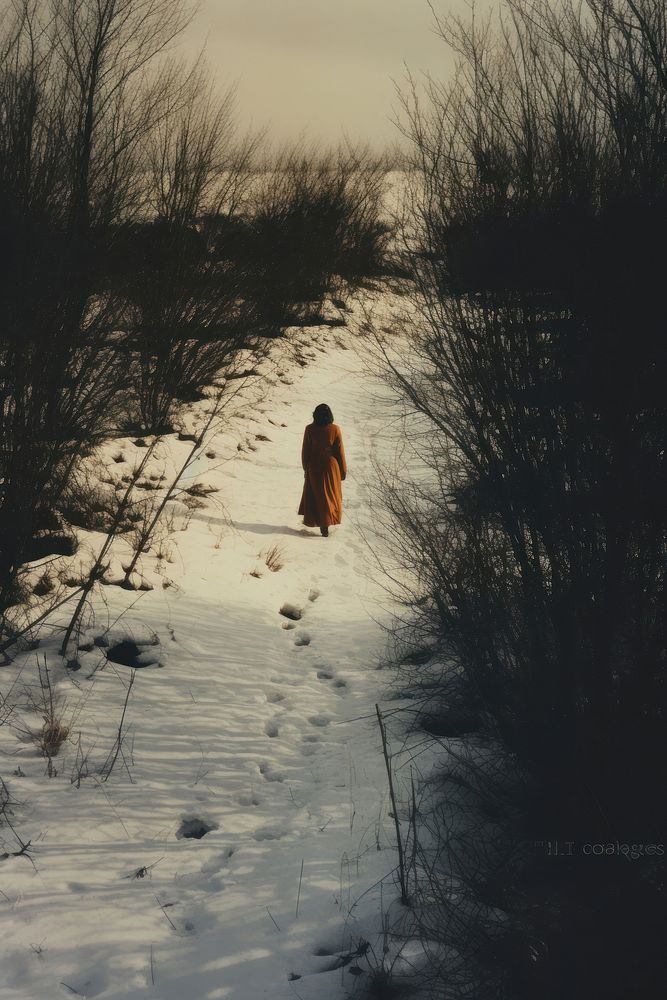 Woman walking in snow land photography landscape.