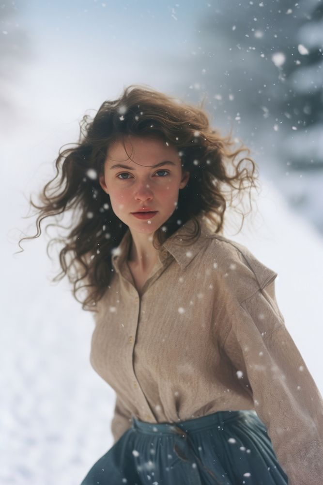 Happy woman walking in snow photography portrait outdoors.