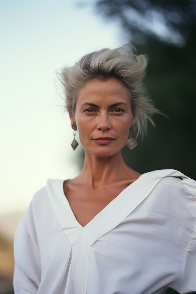 A mature woman wear white photography portrait female.