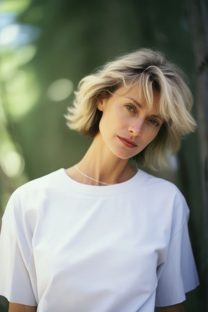 A mature woman wear white blonde person female.