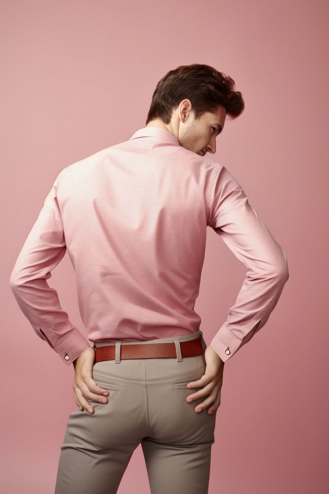 Young man having back pain accessories accessory clothing.