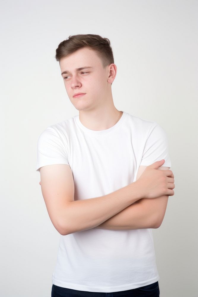 Young man having shoulder pain photo photography clothing.