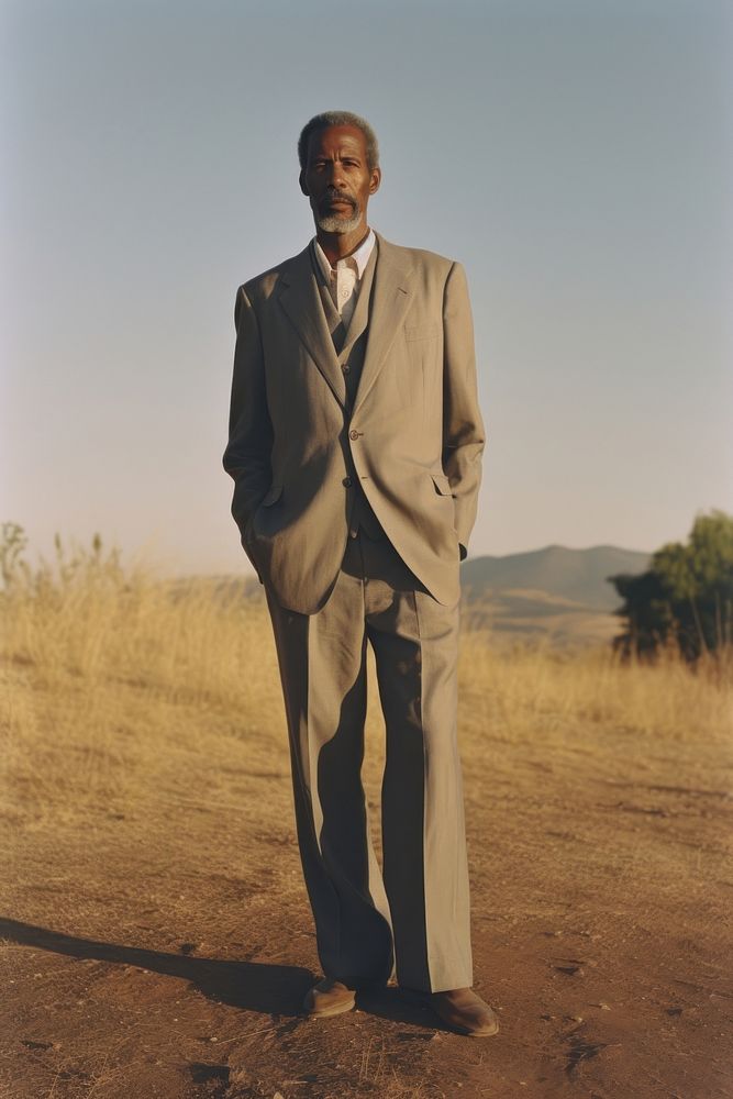 Full body portrait a mature affrican man photography suit clothing.