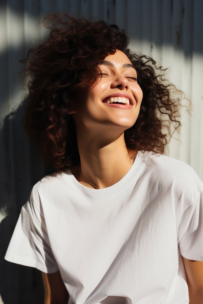 cheerful woman in white t-shirt