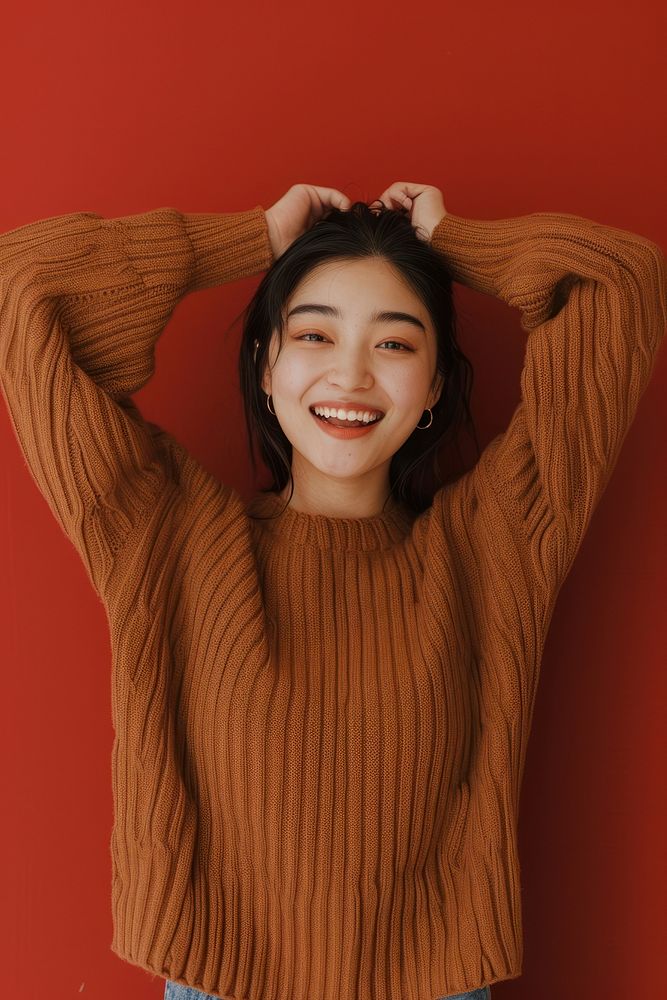 Asian woman sweater smiling smile.