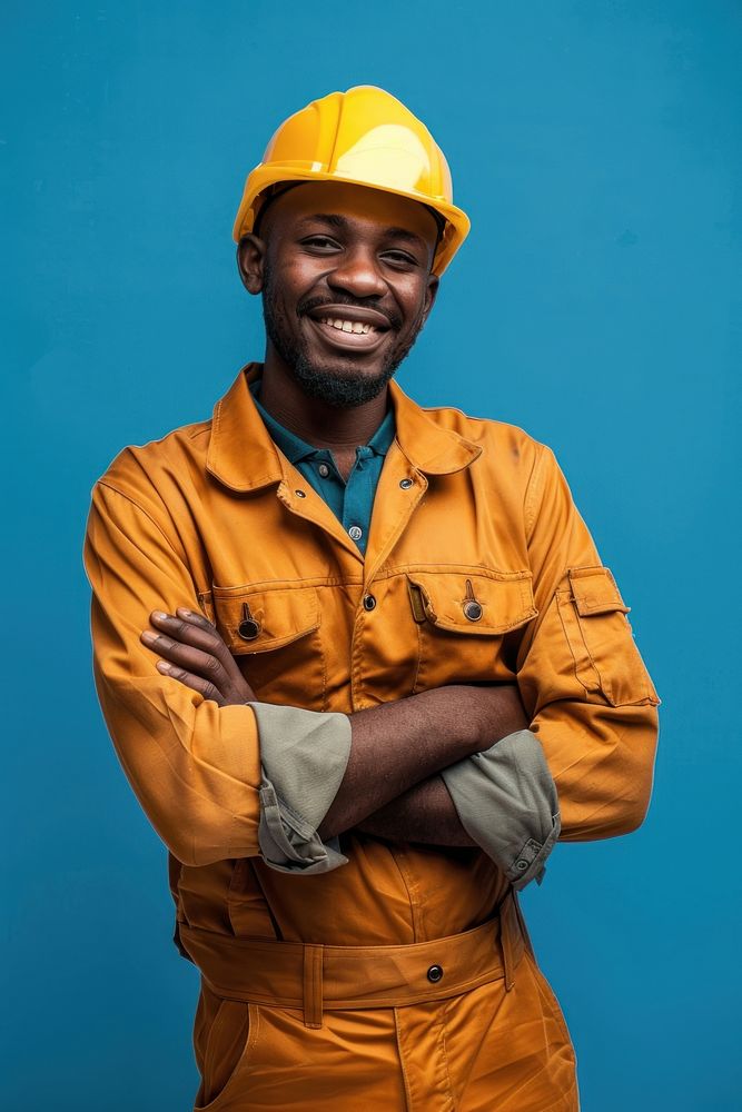 Joyful male african american builder smile hardhat helmet.