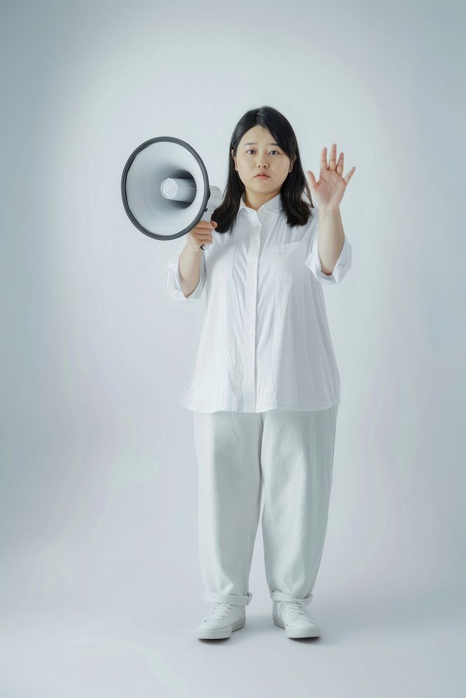 Woman holding megaphone portrait white photo.