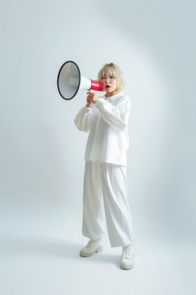 Woman holding megaphone portrait white photo.