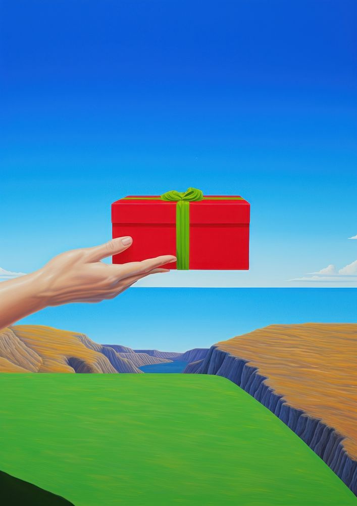 Hand holding gift box.