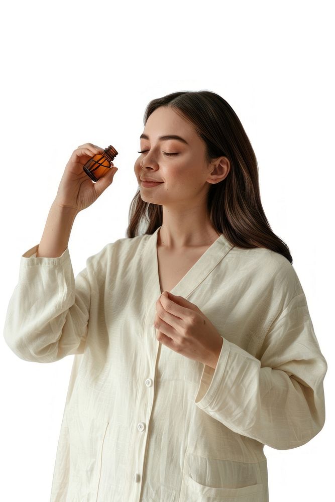 A woman applying essential oil cosmetics beverage drinking.