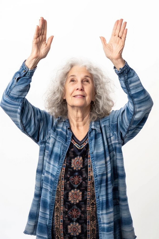 Caucacian senior woman raising hands portrait adult photo.