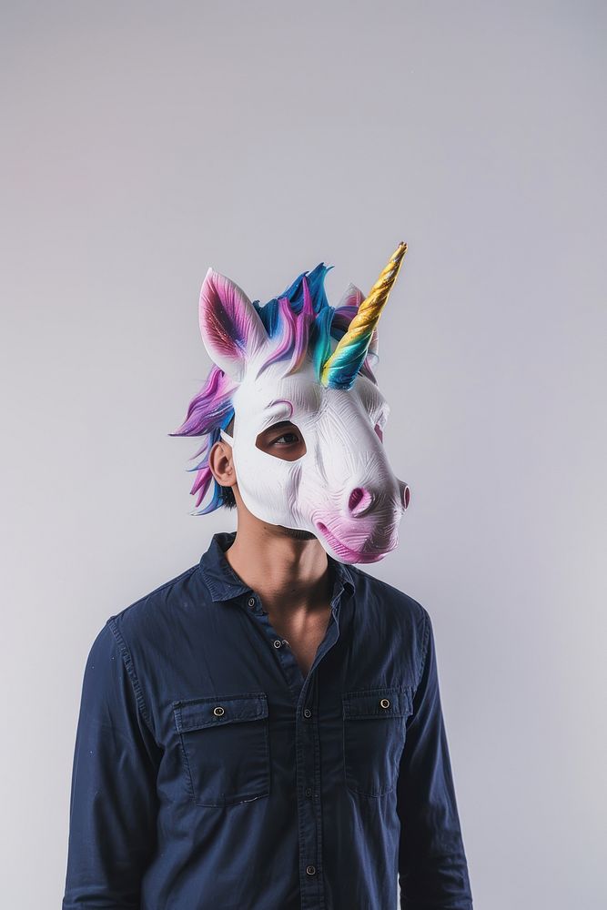 Man wear unicorn mask portrait photo photography.