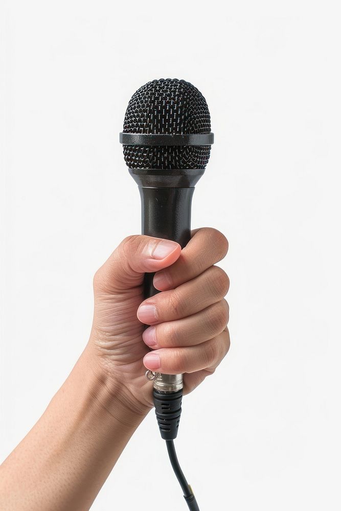 Hand holding microphone electrical device.