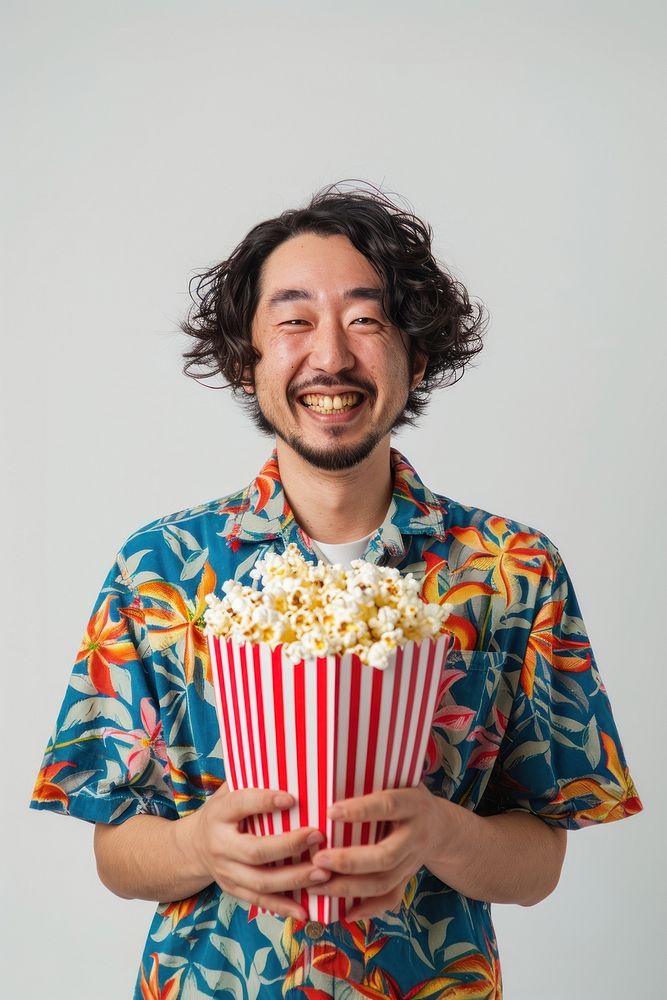 Man holding popcorn happy person human.