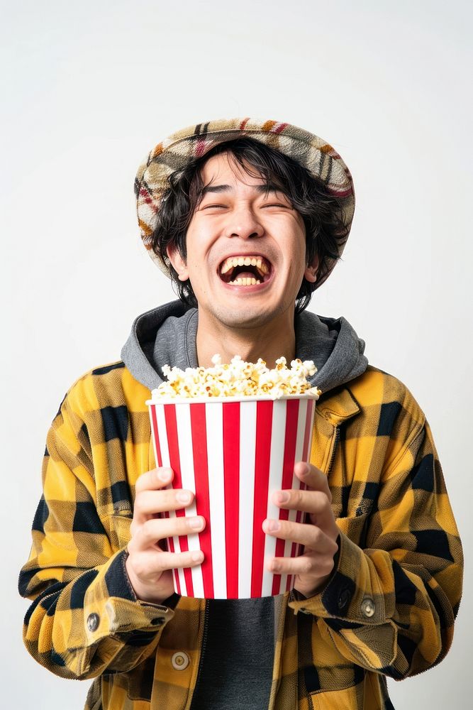 Man holding popcorn happy laughing person.