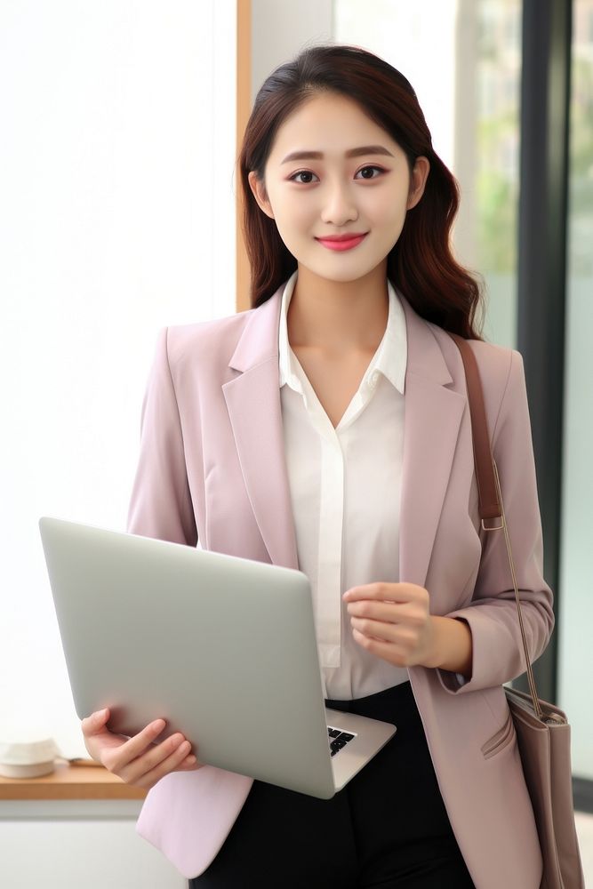 Young japanese business woman laptop electronics executive.