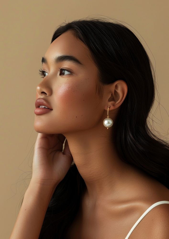 Volumetric attractive elegant Hispanic woman photography earring.