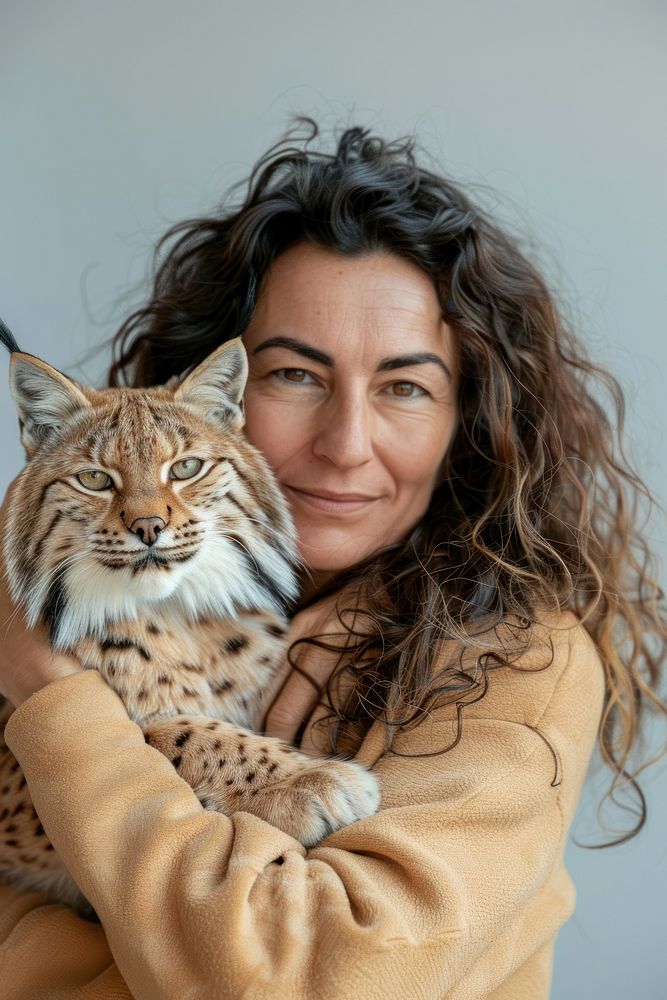 Holding a pet lynx portrait photo photography.