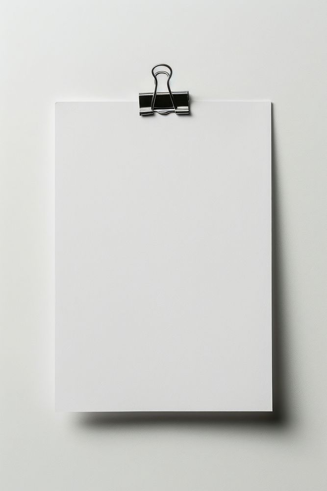 Blank paper withpaper clip white white background simplicity.