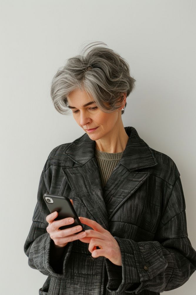 Adult playing smartphone portrait photo woman.