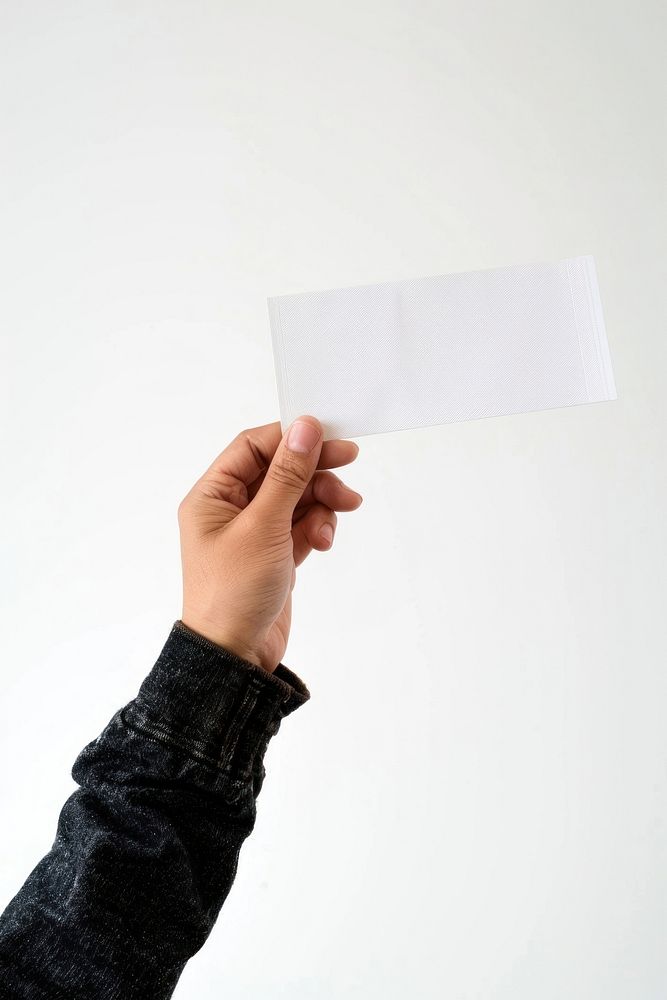 Hand holding receipt white paper white background.