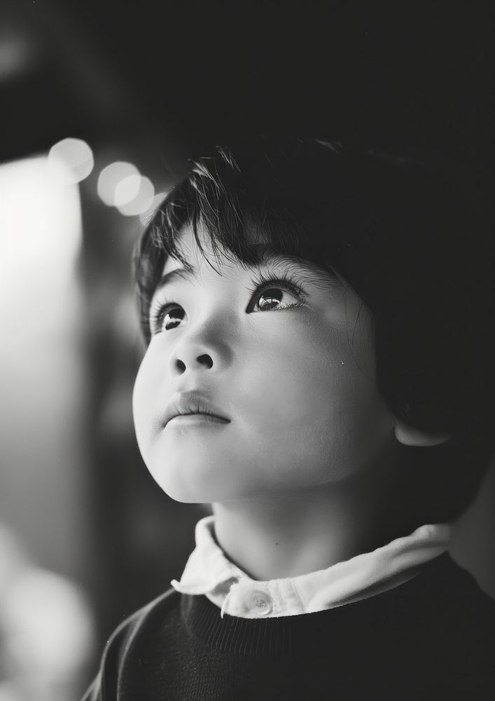 Analog black and white film photography of an asian kid portrait person human.