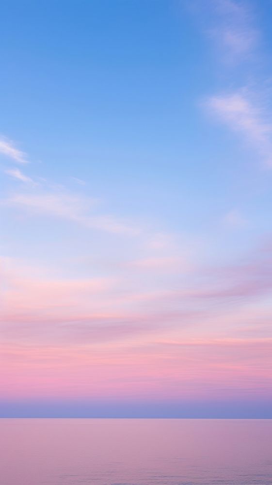 Blue ocean pink sky landscape outdoors horizon.
