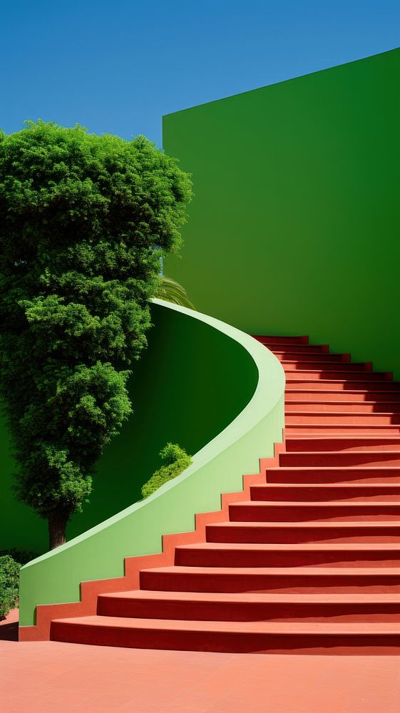 Green stair red wall architecture staircase outdoors.
