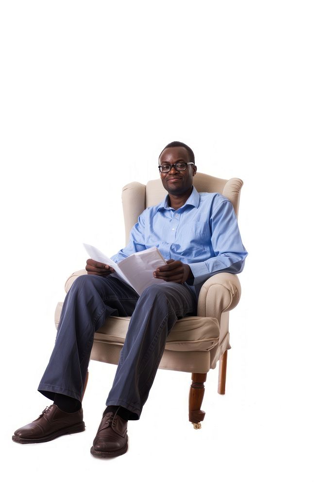 Smiling business man sitting reading chair.