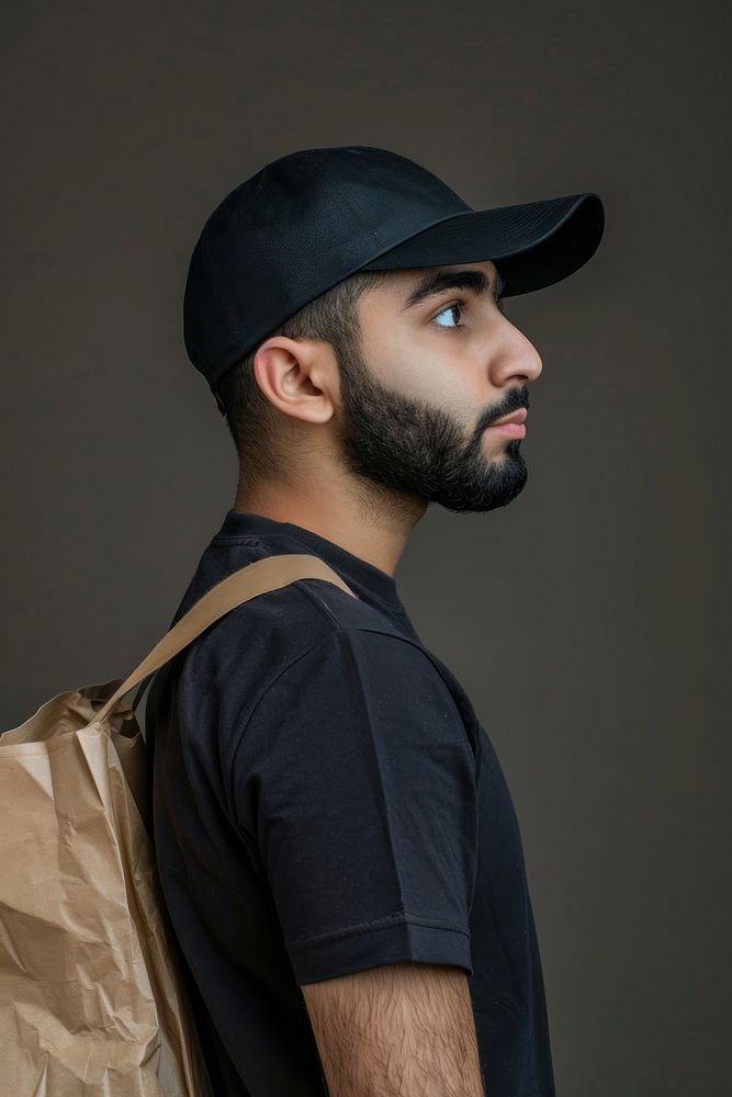 Middle eastern delivery man side portrait photo photography accessories.