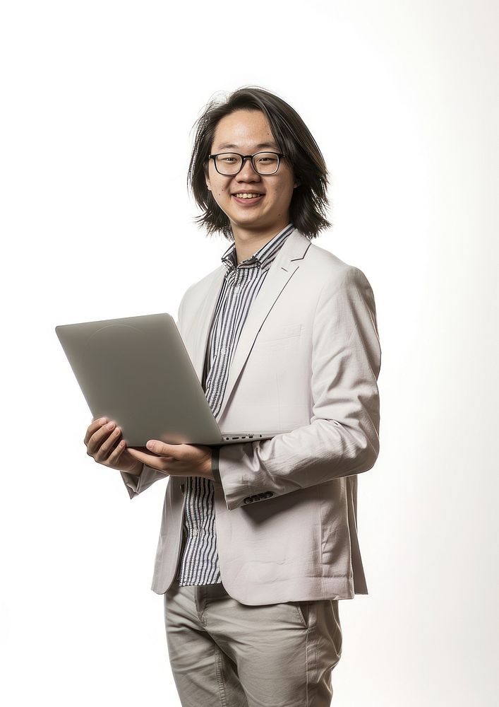 A young Asian man wearing glasses photography portrait computer.
