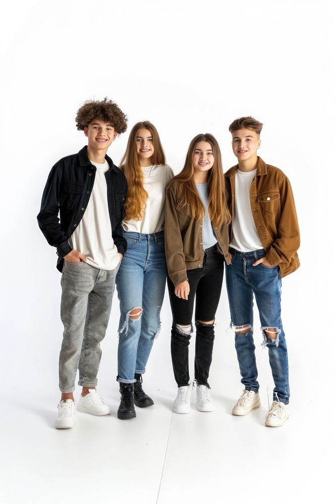 Smiling teenage women and men standing in front the wall groupshot clothing footwear.