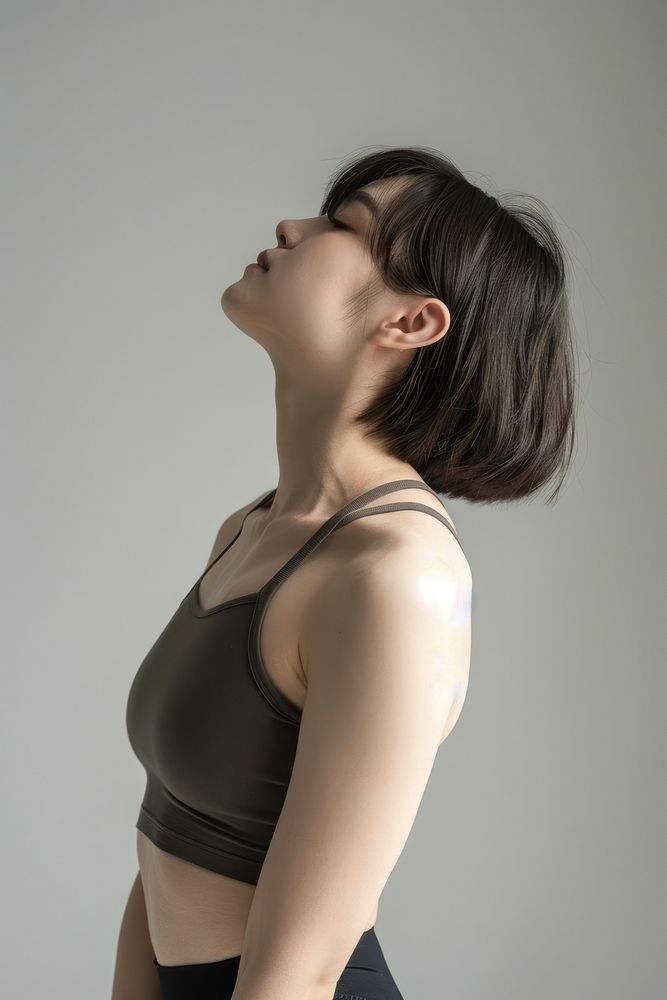 Young bob hair asian woman stretch after yoga photo photography underwear.