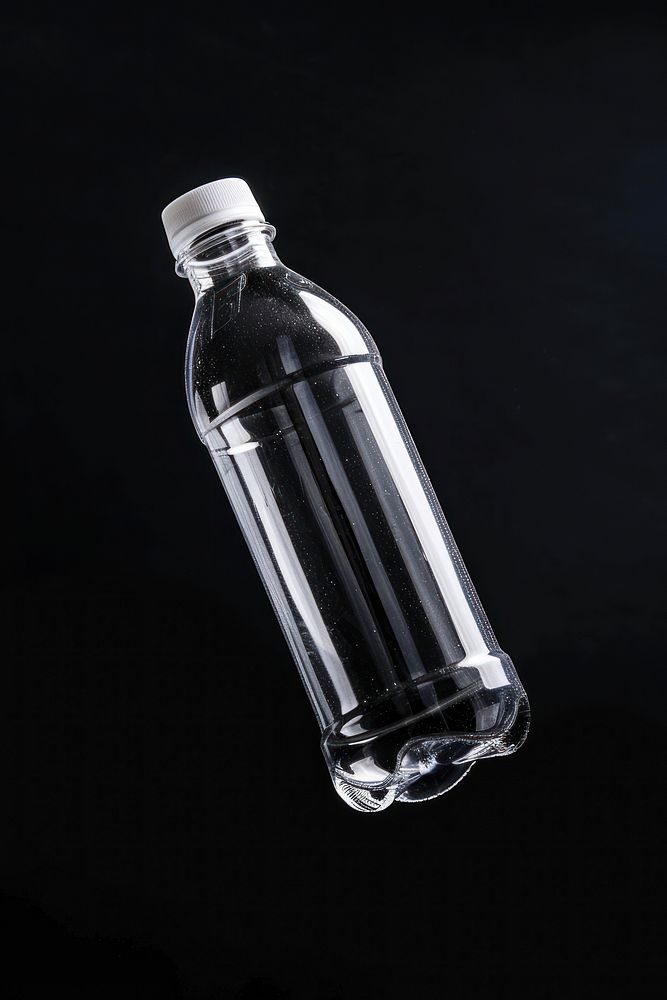 Clear plastic bottle mockup drink black black background.