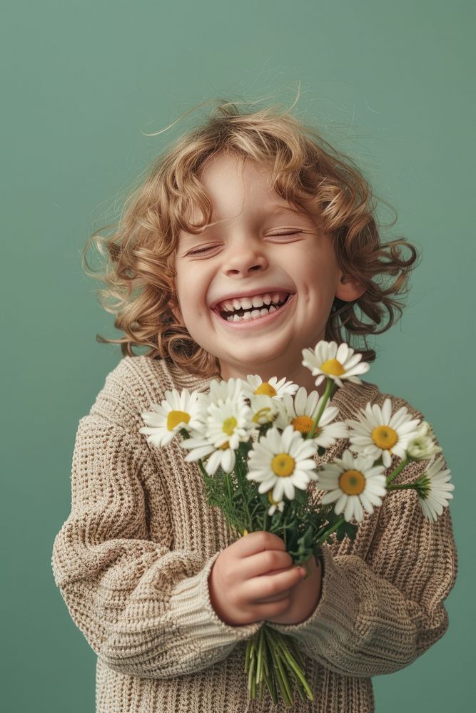 A joyful child laughing portrait holding.
