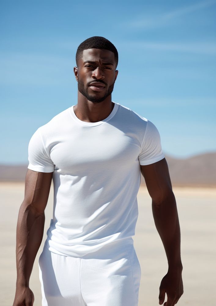 Black man in white sport wear undershirt beachwear clothing.