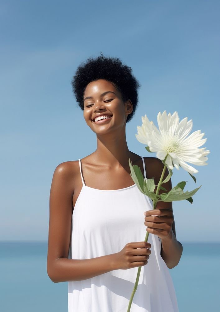 Black Woman in white dress flower happy woman.