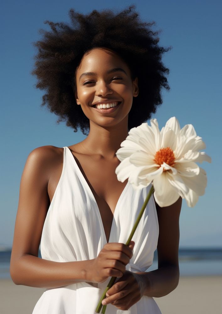 Black Woman in white dress flower photo happy.